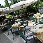 Palme & Hotel Garda (Verona)